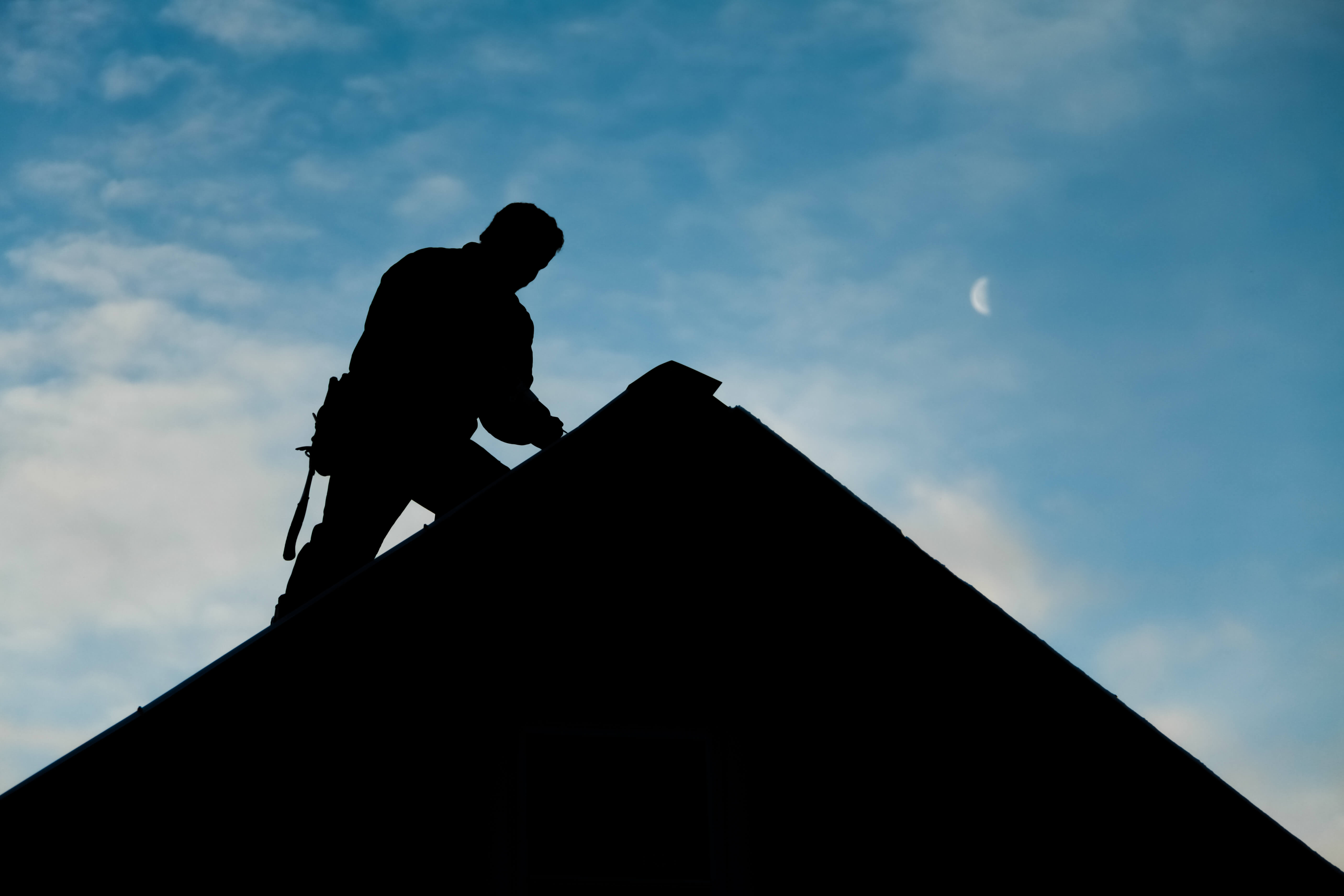 Commercial roofing contractor at work